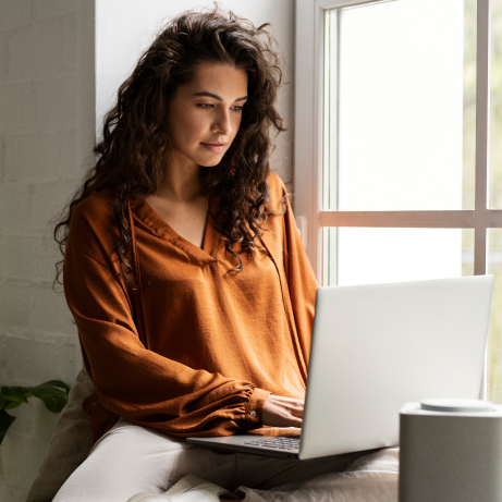 medium-shot-woman-working-laptop medium-shot-woman-working-laptop